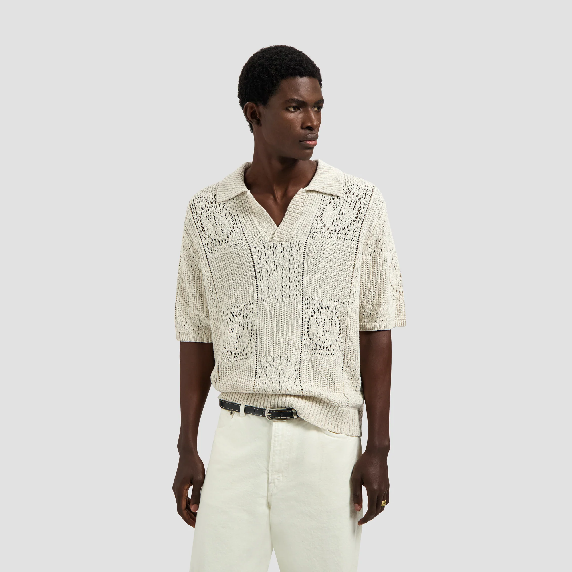 Polo en maille à logo visage blanc cassé